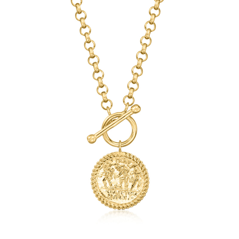 Gold-toned chain necklace with round coin charm and toggle clasp, close-up