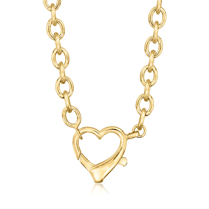 Gold-tone necklace with oversized heart-shaped clasp at center
