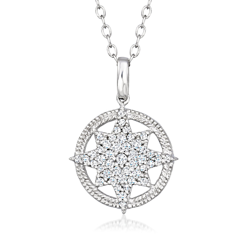 Sterling silver diamond compass pendant with starburst center and round halo
