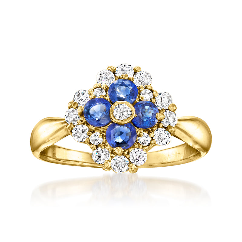 18kt yellow gold cluster ring with round blue sapphire and white diamond accents