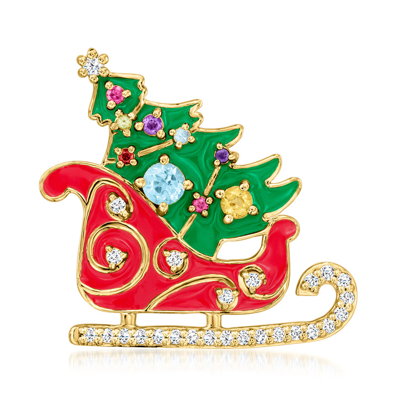 Gold-tone sleigh pin with red and green enamel, multicolor gemstone accents, crystal trim