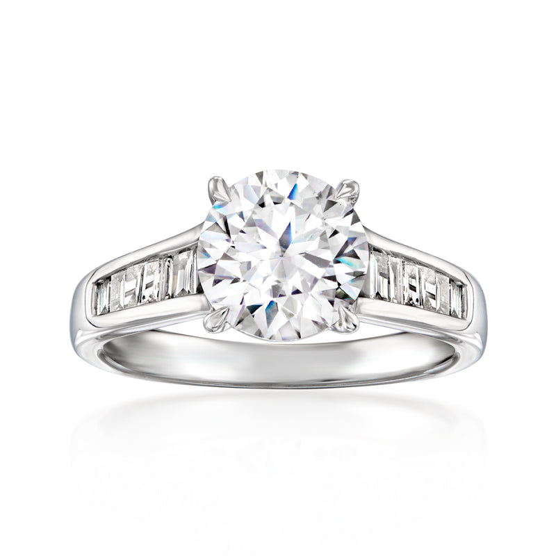 14kt white gold ring with round lab-grown diamond center and baguette side stones