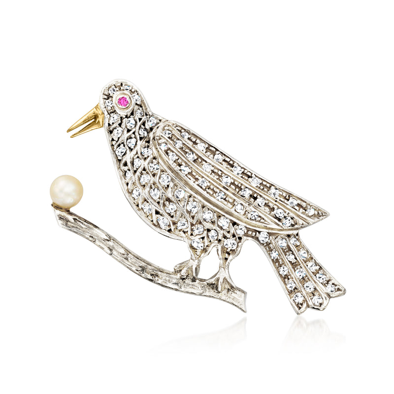 Vintage bird pin in sterling silver with cultured pearl, ruby eye, and diamond accents