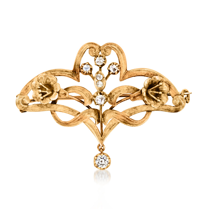 Vintage yellow gold floral diamond pin with round stones and dangling drop