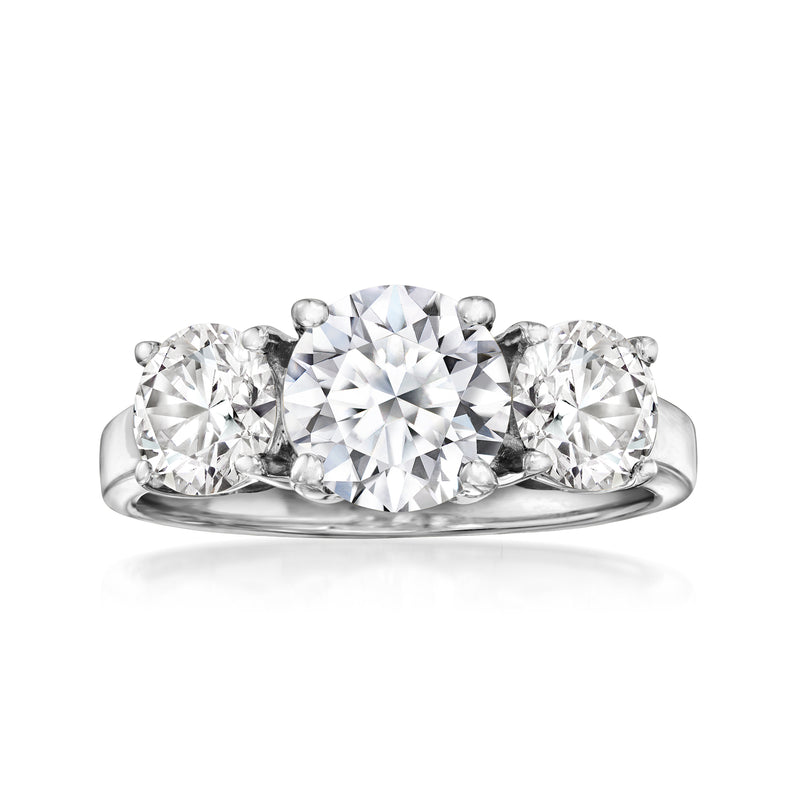 14k white gold three-stone ring with three round lab-grown diamonds on polished band