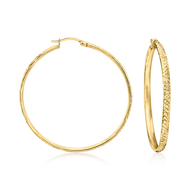 Large gold over sterling hoop earrings with hinged clasp, smooth round oval shape