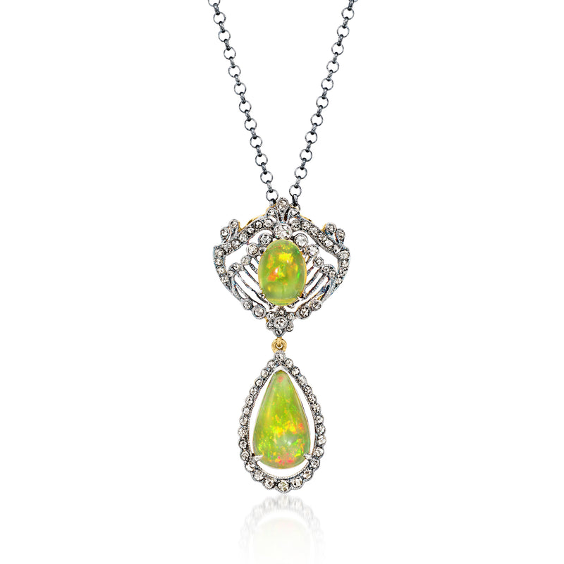 Sterling silver pendant necklace with oval green opal and diamond-like accents