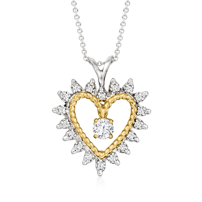 Two-tone 14kt gold heart pendant necklace with diamond halo and center stone