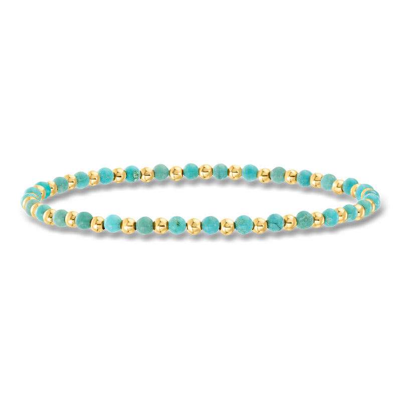 Turquoise bead stretch bracelet with yellow gold spacer beads