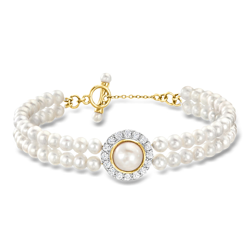 Cultured pearl and zircon bracelet with gold-toned clasp and circular crystal center