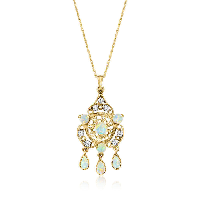 Yellow gold opal and diamond pendant necklace with oval blue stones and round accents