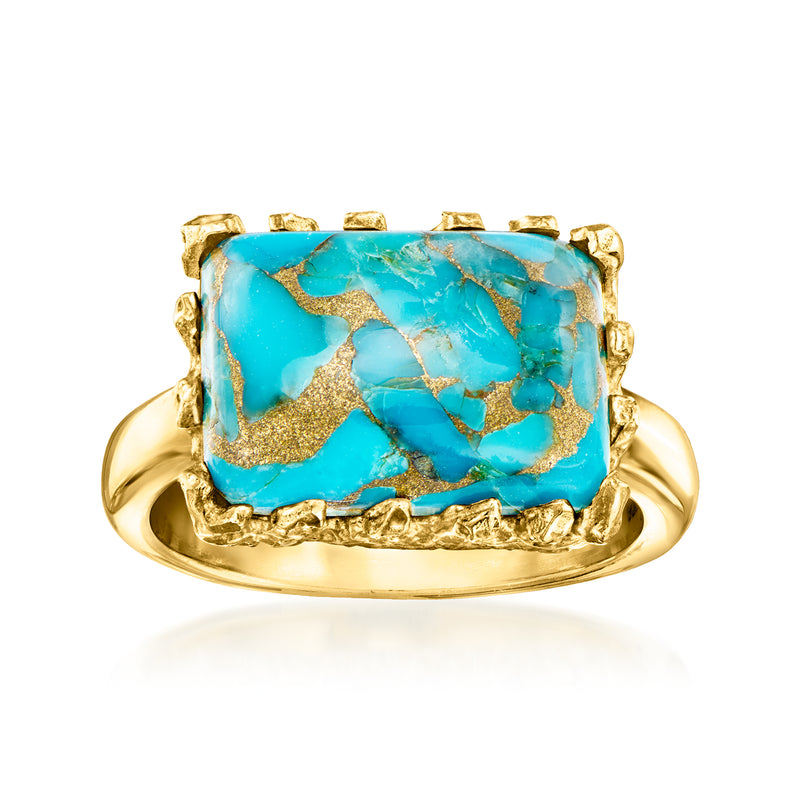 Rectangular turquoise stone ring in gold-tone settings with ornate bezel, band visible
