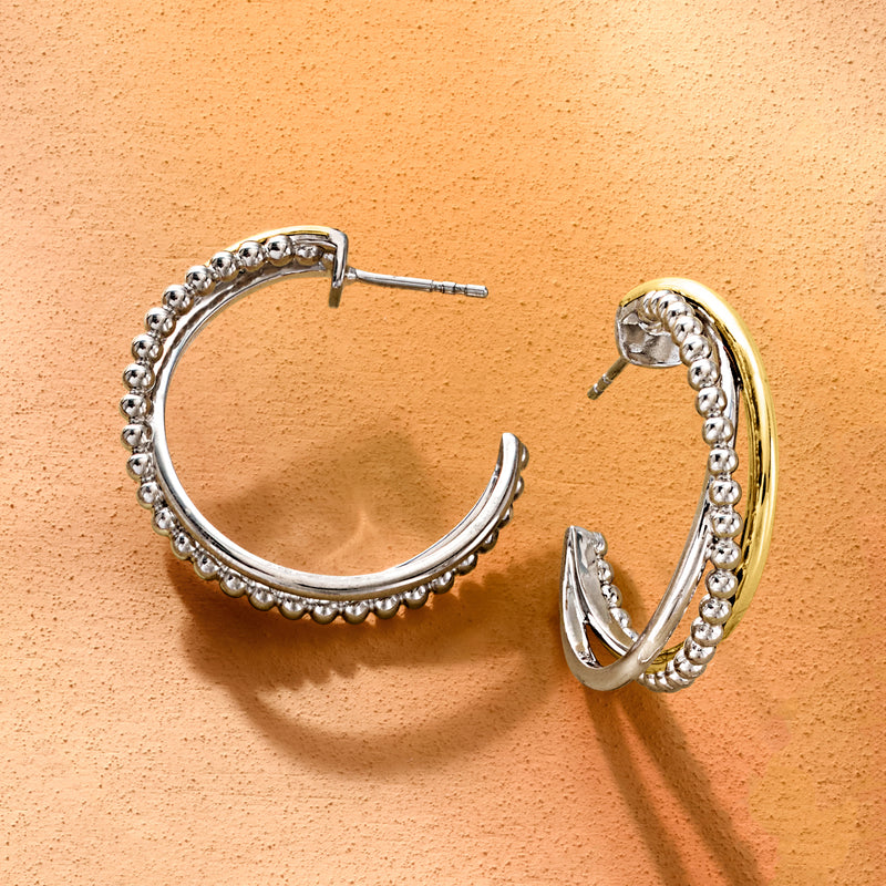 Sterling silver hoop earrings with yellow gold center stripe and bead detail