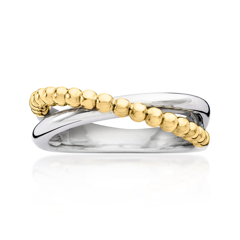 Crisscross ring with polished sterling silver band and yellow gold bead links
