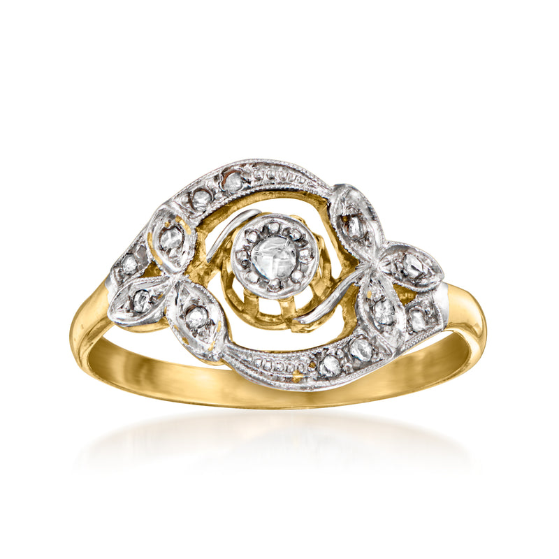 Vintage 18kt yellow gold diamond swirl ring with round center stone