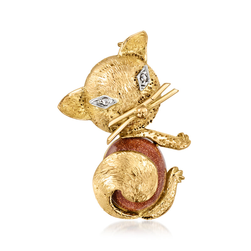 Vintage cat pin in 18kt yellow gold with red goldstone cabochon and diamond eyes