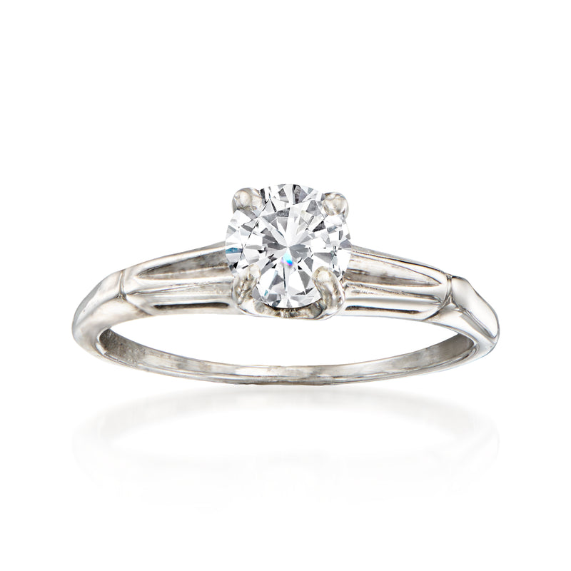 Vintage 14kt white gold diamond ring with round center stone and slim split prongs