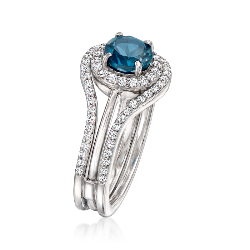 Sterling silver ring guard with sparkling white stones and oval blue center gemstone
