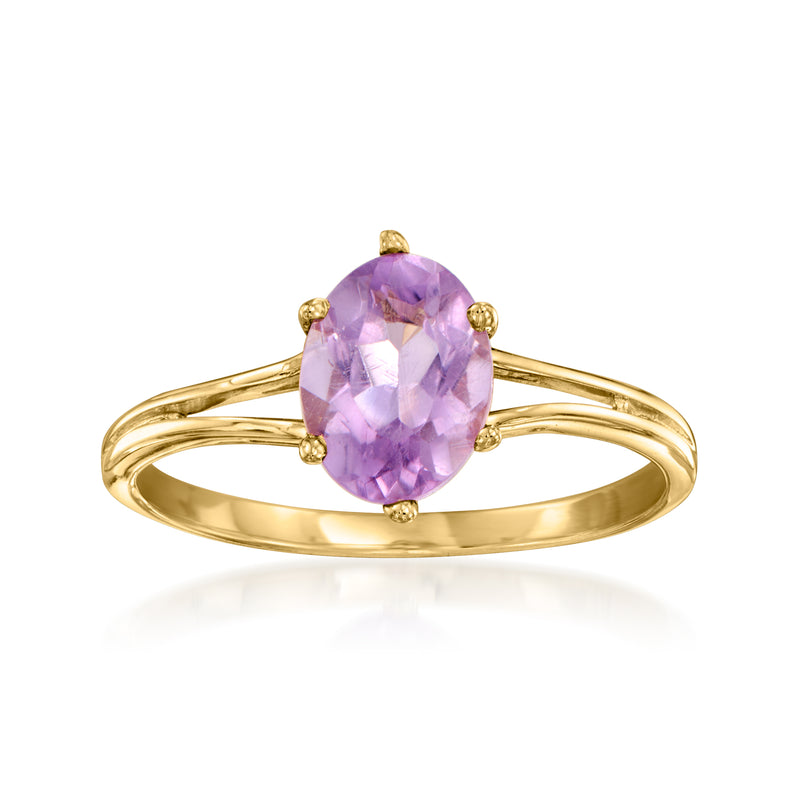 Vintage amethyst oval ring in 14kt yellow gold with three small round gold accents