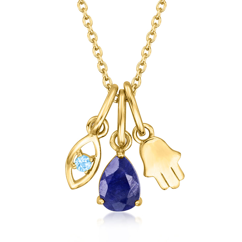Gold cable-chain necklace with interchangeable blue teardrop, hamsa, and oval pendant