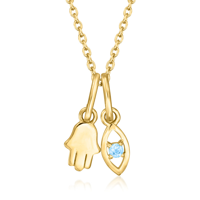 Gold cable-chain necklace with interchangeable hamsa and light blue oval pendant
