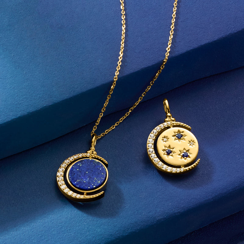 Two gold celestial pendant necklaces: blue center discs with white stones and starry moon