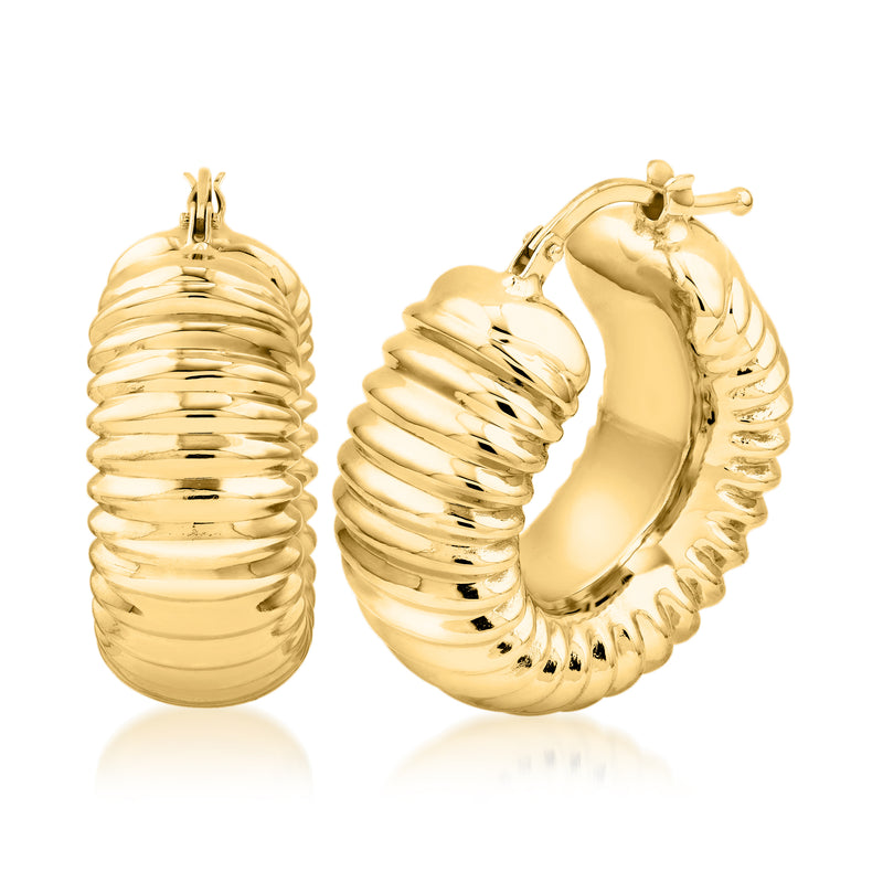 Yellow gold ribbed hoop earrings, side view with secure clasp