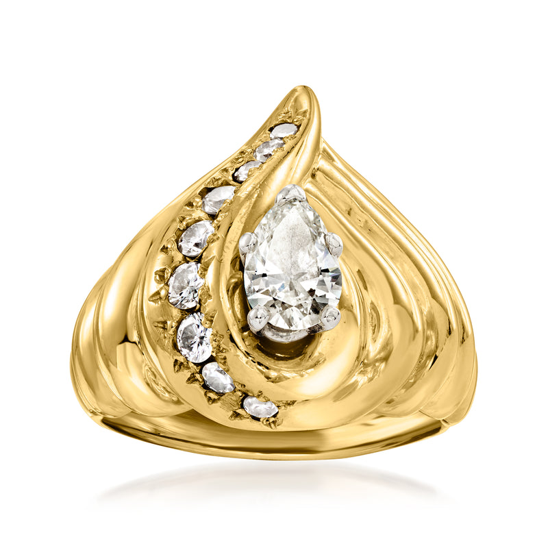 Yellow gold diamond ring with pear-shaped center stone and round side diamonds
