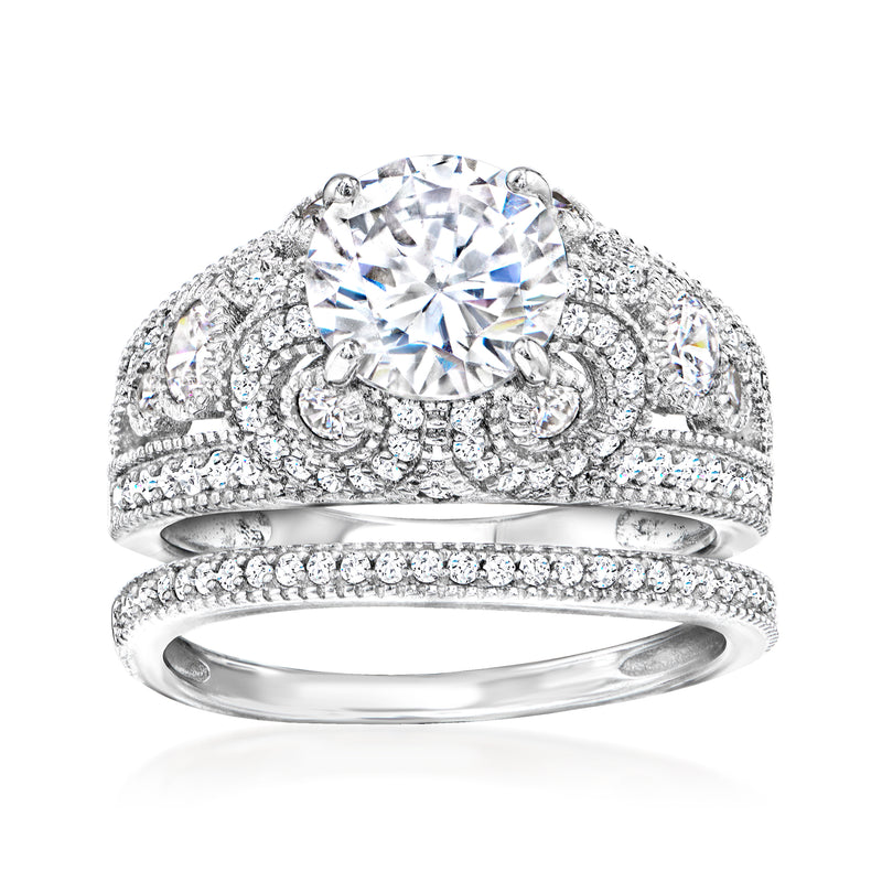 Sterling silver CZ two-ring set with large round center stone and pave bands