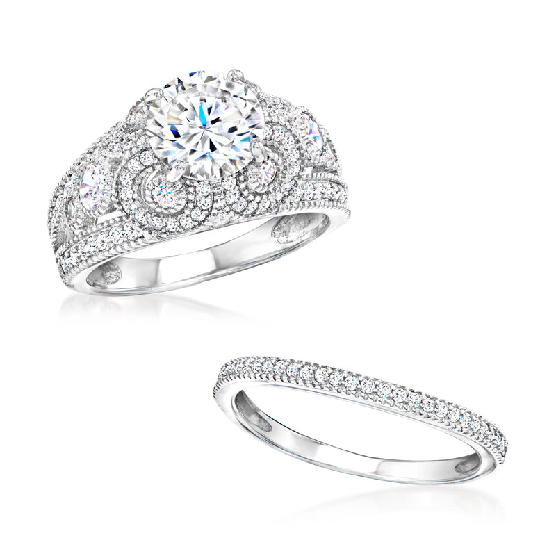 Sterling silver CZ ring set with round center stone and matching pave band