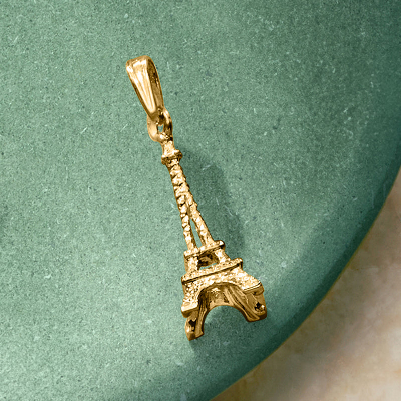 Close-up of 10kt yellow gold Eiffel Tower pendant charm