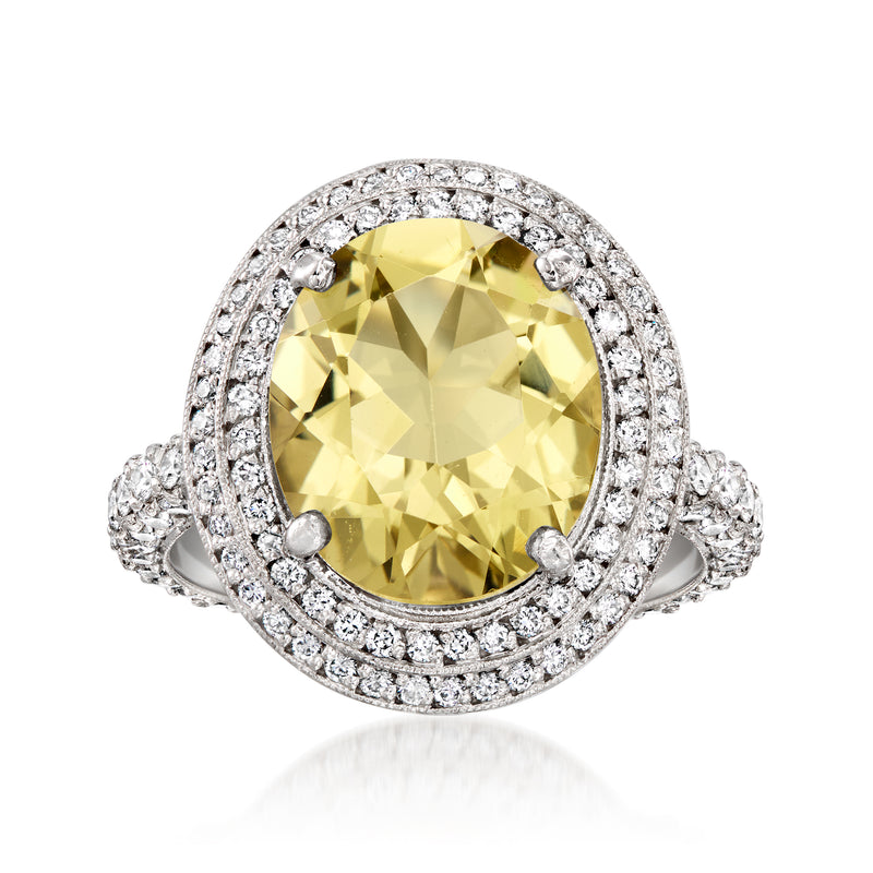 Platinum lemon quartz ring with oval center stone and double diamond halo