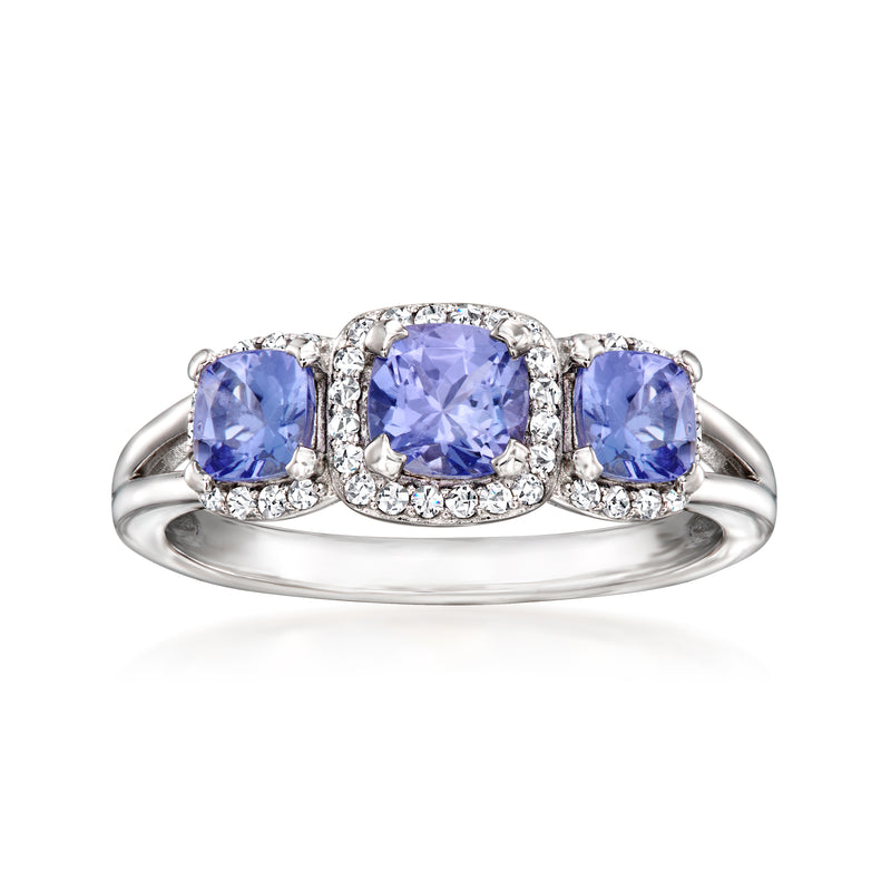 Sterling silver ring with three cushion-cut tanzanite-style stones and white zircon accents