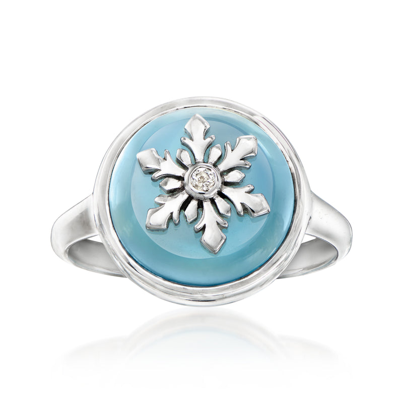 Sterling silver snowflake ring with blue oval center and white stone