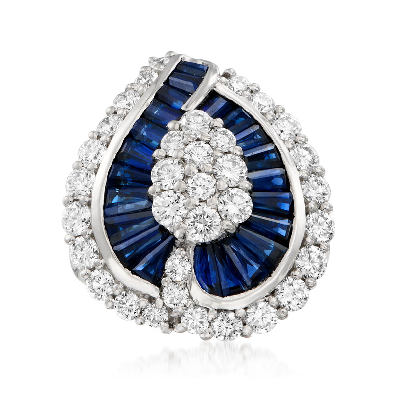 Platinum sapphire and diamond ring with teardrop blue sapphire and diamond cluster