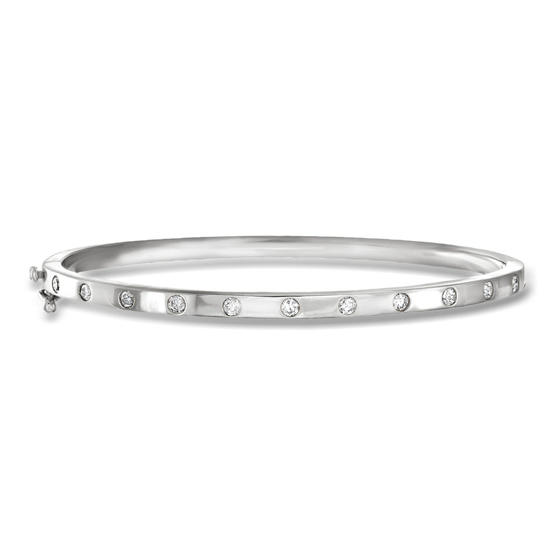 14kt white gold bangle bracelet with dotted round diamond accents, slim profile