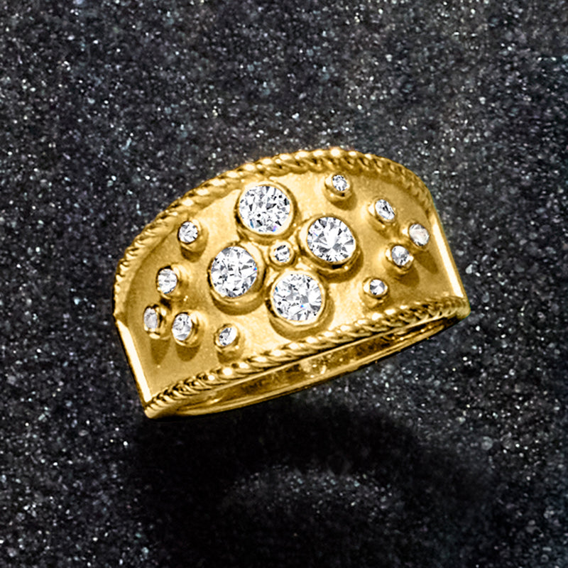 Gold-tone wide diamond ring with clustered round stones and rope border