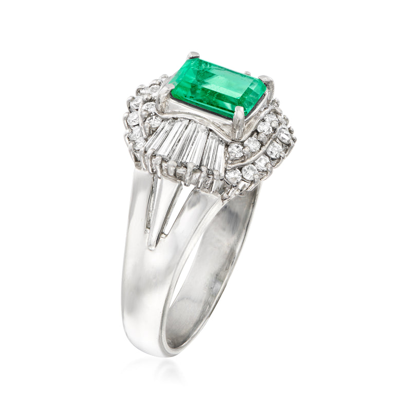 Platinum emerald-cut green center ring with diamond rows, side profile