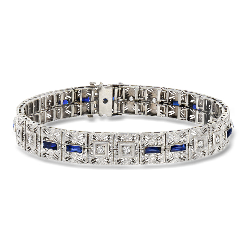 Vintage filigree bracelet in white metal with blue square sapphire accents and clear stones