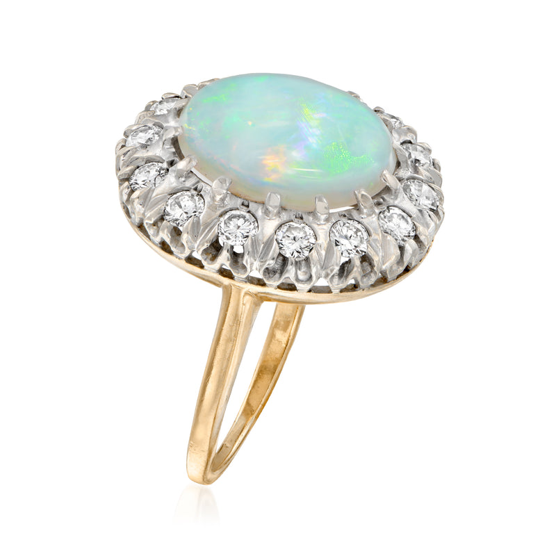 Vintage opal and diamond ring with oval opal, diamond halo, 14kt yellow gold band