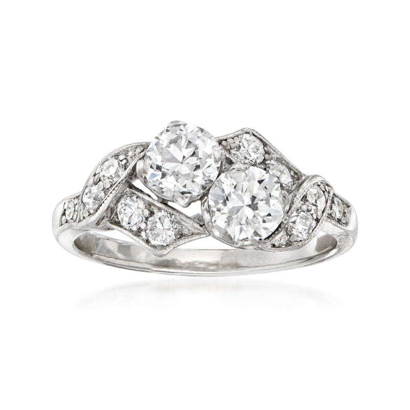 Vintage platinum toi et moi diamond ring with two round center stones and pave accents