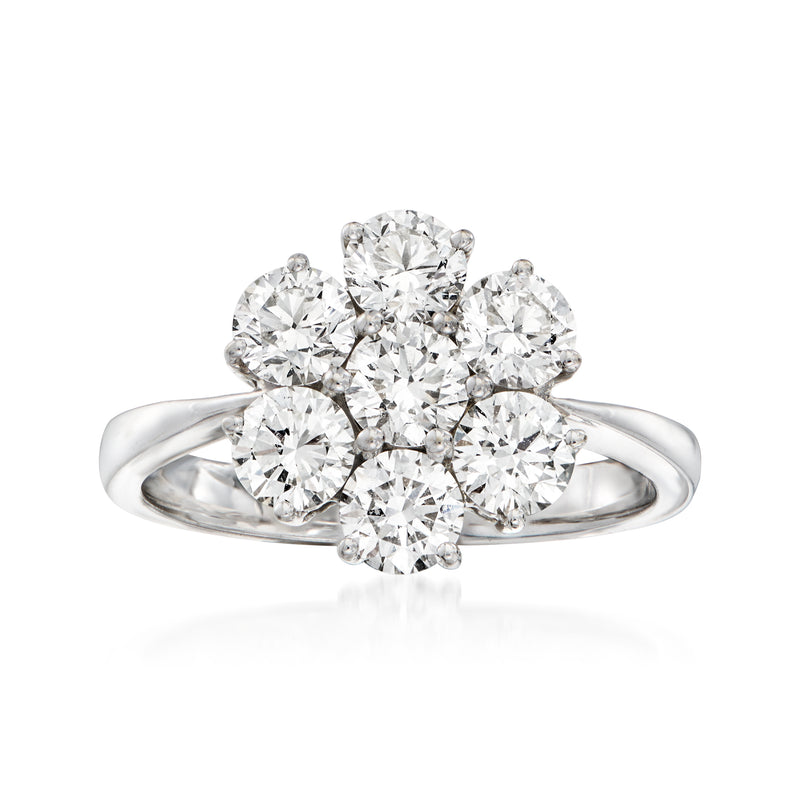 Vintage 18kt white gold diamond flower ring with clustered round-cut stones