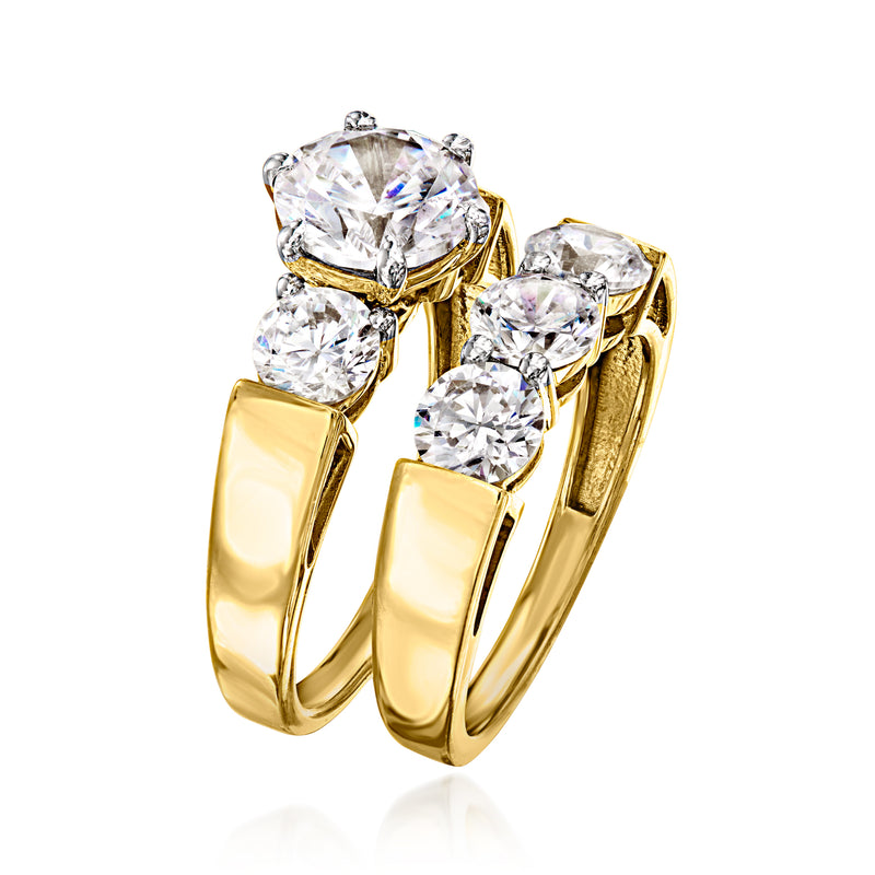 Gold-tone CZ two-ring set with prong-set round clear stones and square settings