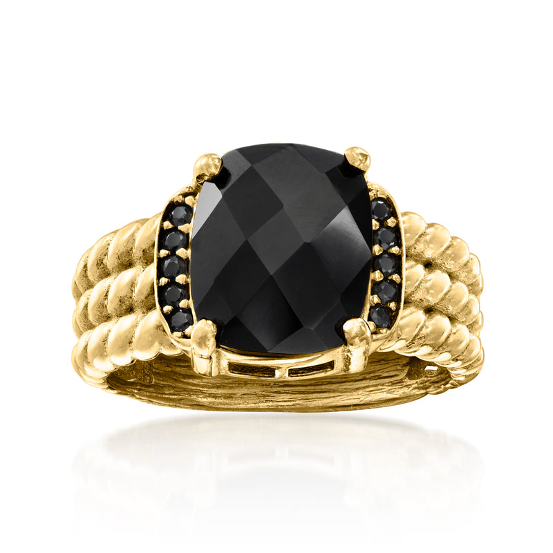 Gold ring with oval black gemstone, black side stones, braided band