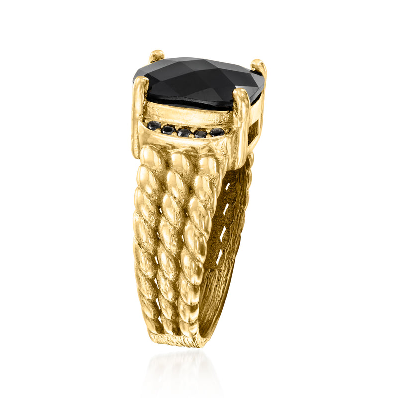 Gold ring with faceted black oval centerpiece, black stone border, woven band