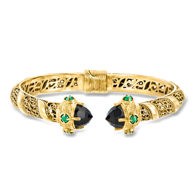 Gold-tone cuff bracelet with dark agate stones and green chalcedony accents