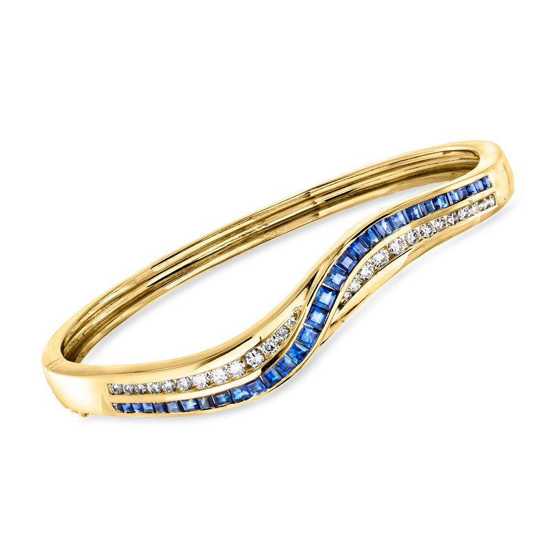 14kt yellow gold bangle bracelet with blue sapphire channel and diamond accents