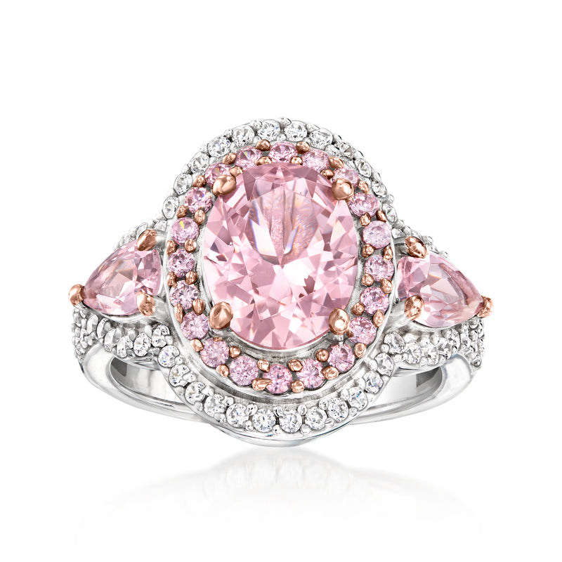 Sterling silver ring with oval pink center stone and halo of pink CZs