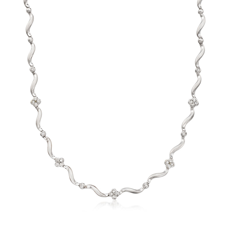 14kt white gold diamond flower station necklace with linked round diamond stations