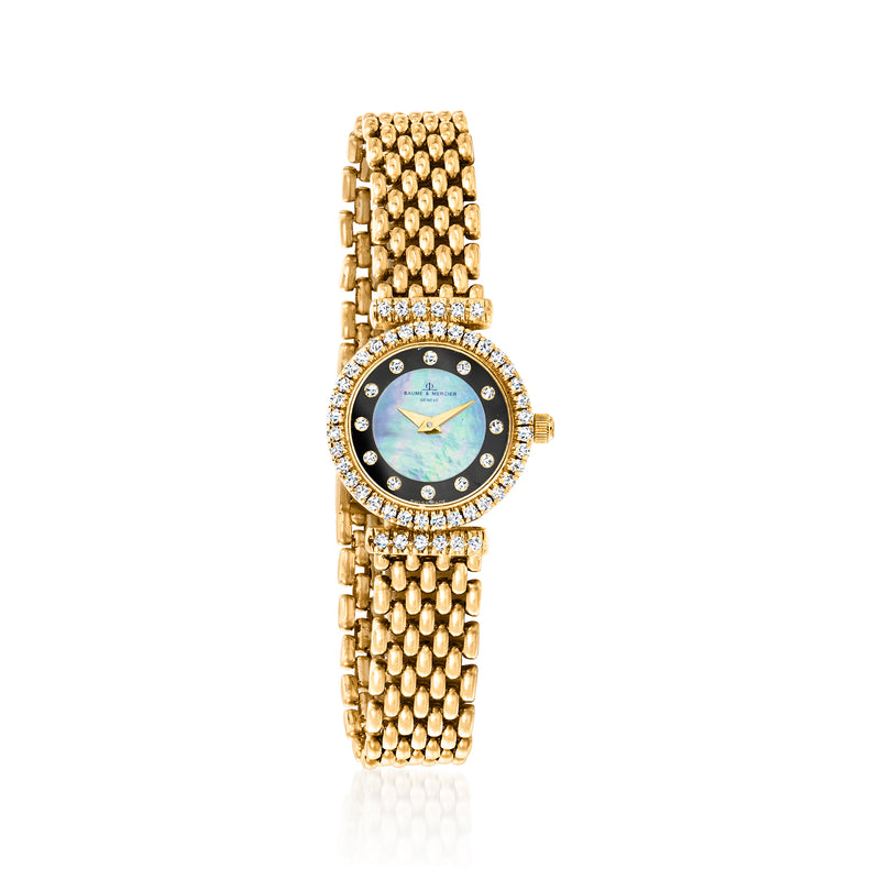 Vintage yellow gold diamond watch with round blue dial and sparkling bezel